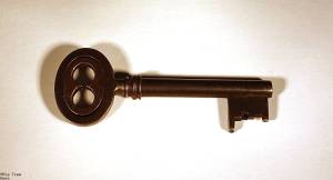 Antique Key that Swivels around Middle with Double Bow and Bit Key 12a